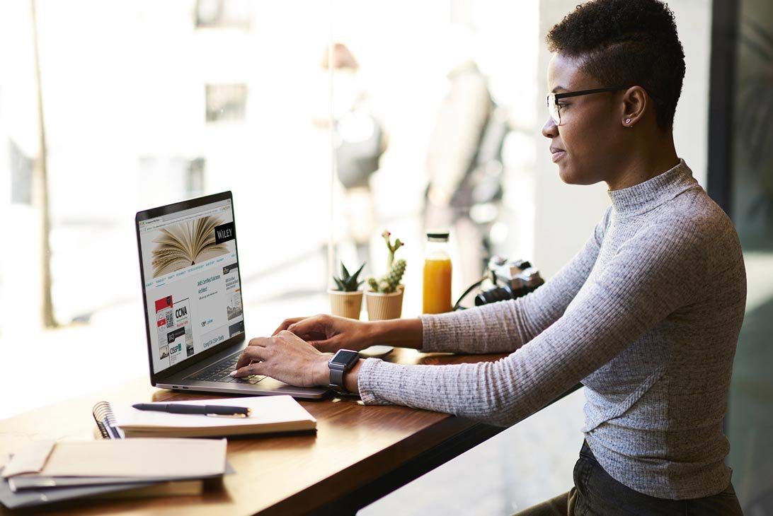 woman typing on a computer